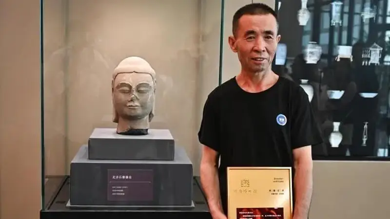 山西村民挖出1400年前北齐佛首,上交获奖万元后实现“身首合璧”