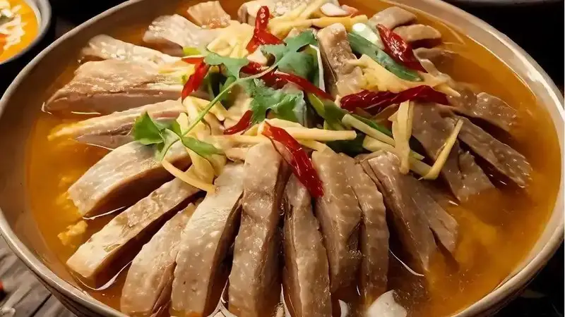 吕文扬:把一锅固始鹅块熬成浸满乡土的老风味