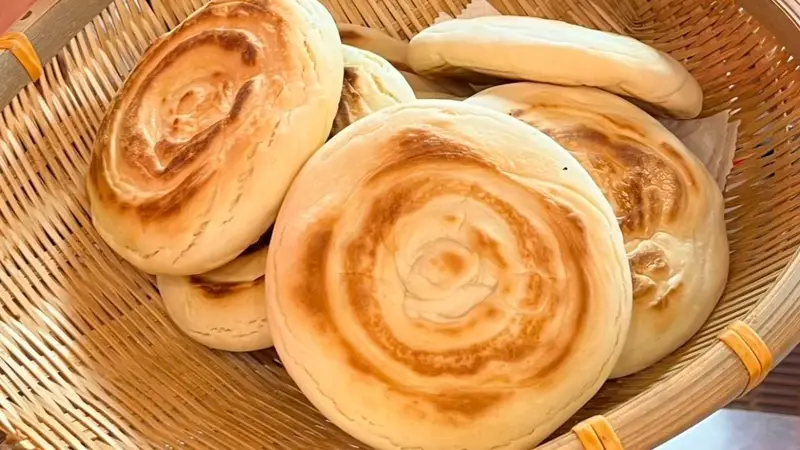 ：白吉馍为何不似烧饼般撒满芝麻？